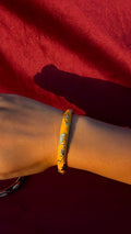 Golden flower bangle