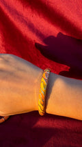 Yellow & orange swirly bangle