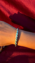 Teal triangle bangle